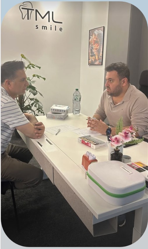 Dr. Alaz Şimşek in a patient consultation
